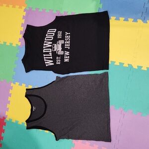 2 size Medium men's sleeveless shirts,  like new,  worn once